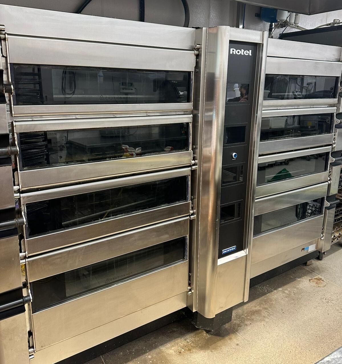 The same ovens with clean steel doors.